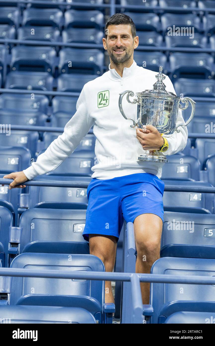 New York, New York, USA. 10th Sep, 2023. Novak Djokovic winner of men's championship of US Open poses with trophy inside of Arthur Ashe stadium at Billie Jean King Tennis Center in New York. By winning the US Open Djokovic equaled the record of 24 held by Margaret Court of most Grand Slam victories. (Credit Image: © Lev Radin/Pacific Press via ZUMA Press Wire) EDITORIAL USAGE ONLY! Not for Commercial USAGE! Stock Photo