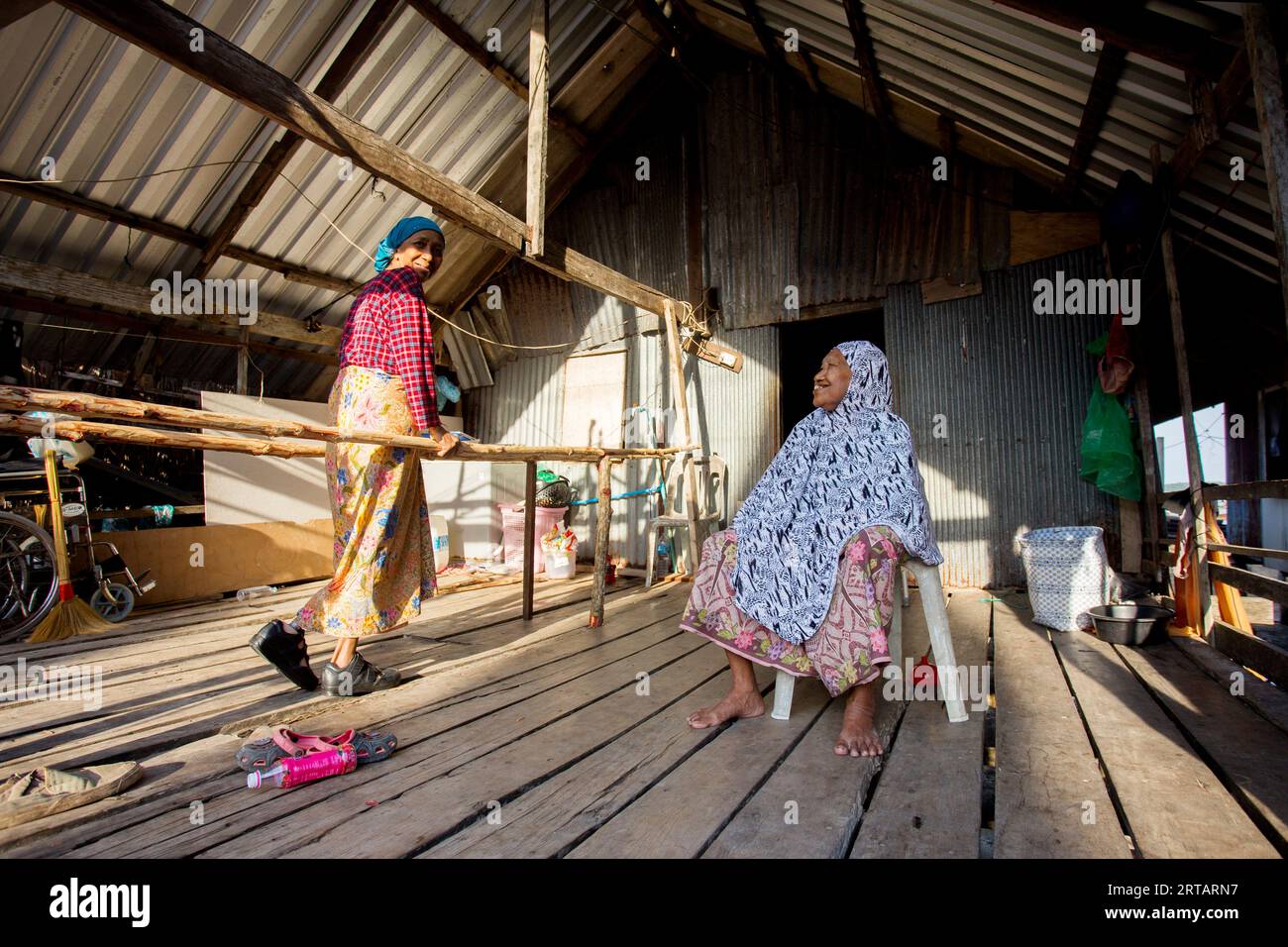 Koh Yao, Thailand; 1st January 2023: Elderly people in a fishing village on the island of Koh Yao in southern Thailand. Stock Photo