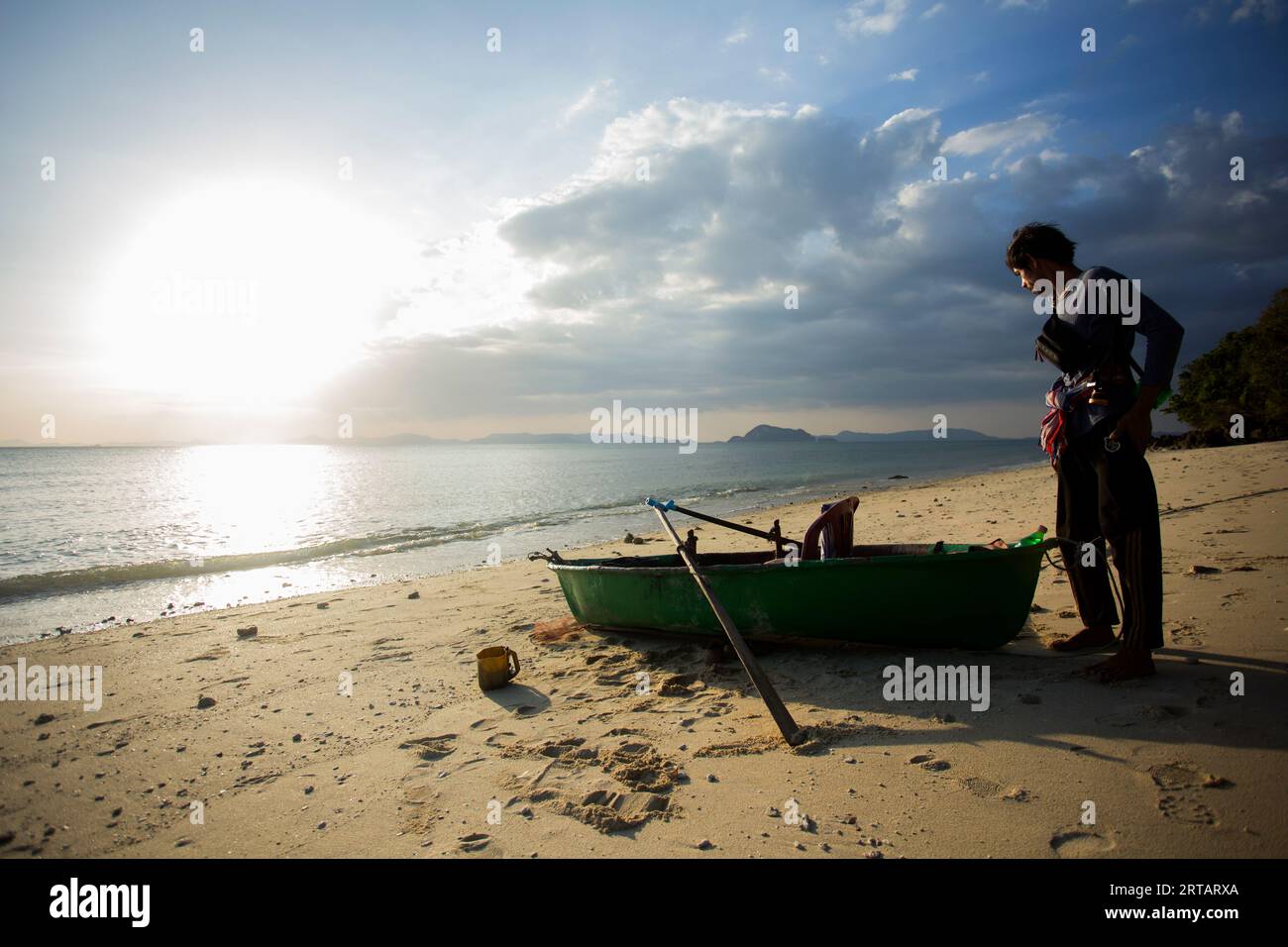 Koh Yao, Thailand; 1st January, 2023: A fisherman preparing his boat to go fishing for squid at night. Stock Photo