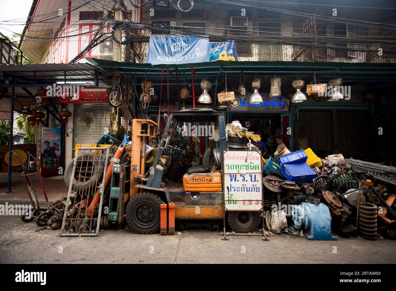 Bangkok, Thailand; 1st January 2023: Mechanical workshop with parts on the streets of Bangkok city Stock Photo