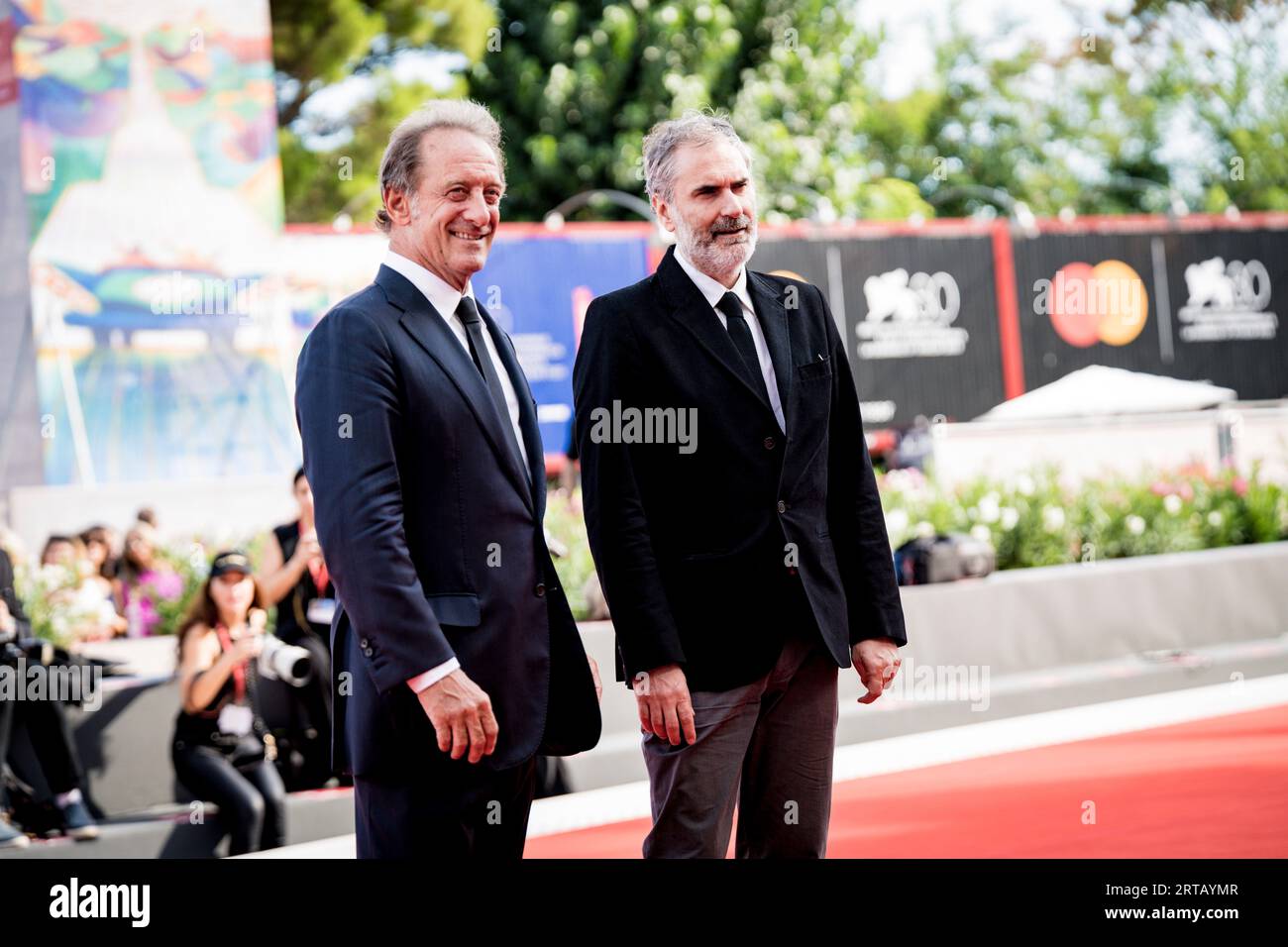 VENICE, ITALY - AUGUST 31: Ramzy Bedia, Xavier Giannoli, Olga Kurylenko
