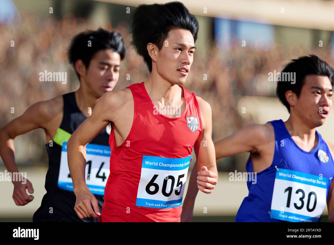 Japanese athletes running on track Stock Photo Alamy