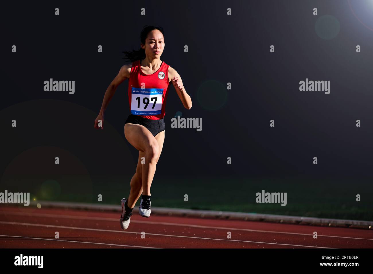 Japanese athlete running on track Stock Photo Alamy