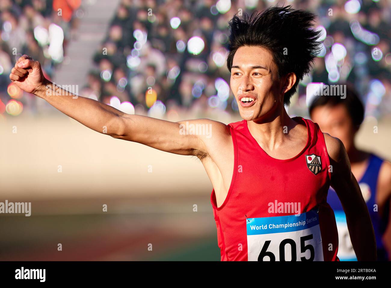 Japanese athlete running on track Stock Photo Alamy