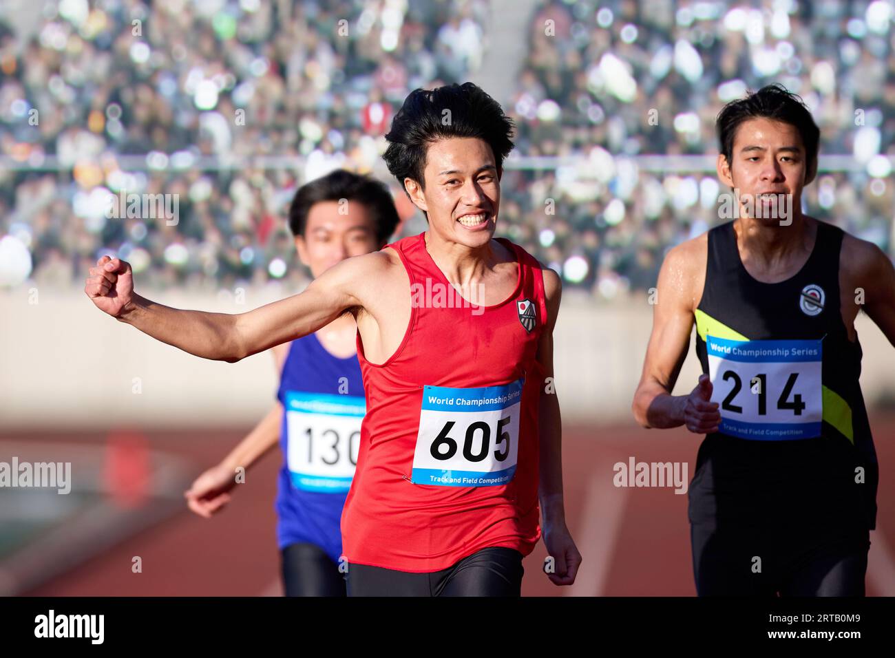 Japanese athletes running on track Stock Photo Alamy