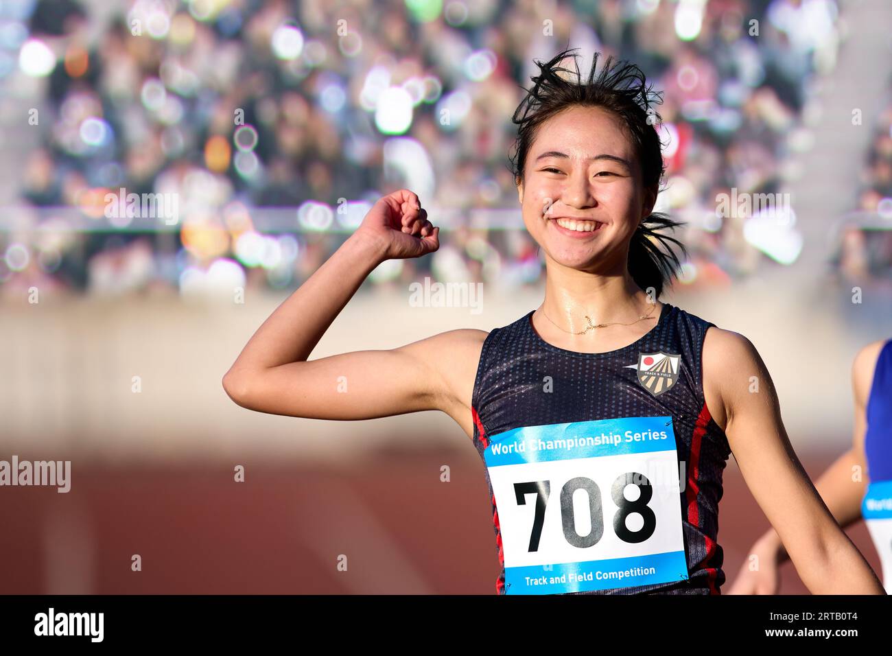Japanese athlete running on track Stock Photo Alamy