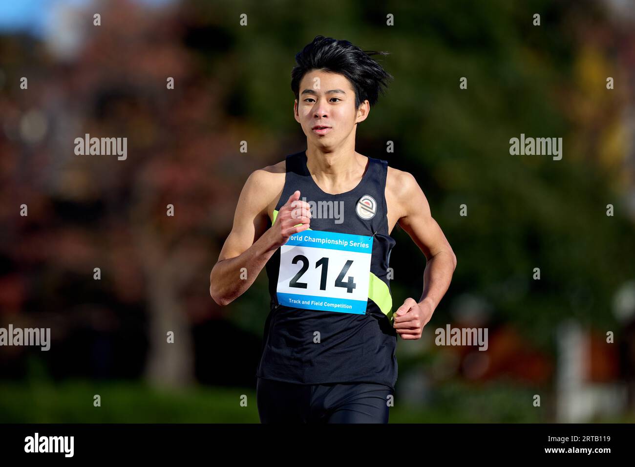 Japanese athlete running on track Stock Photo Alamy