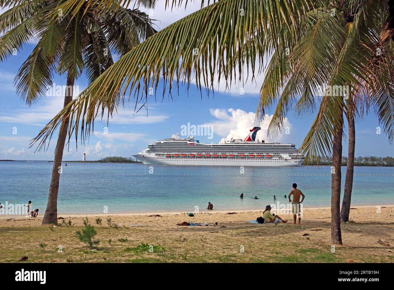 Cruise ship departing the Nassau terminal, seen from Junkanoo Beach, Nassau, New Providence Island, The Bahamas Stock Photo