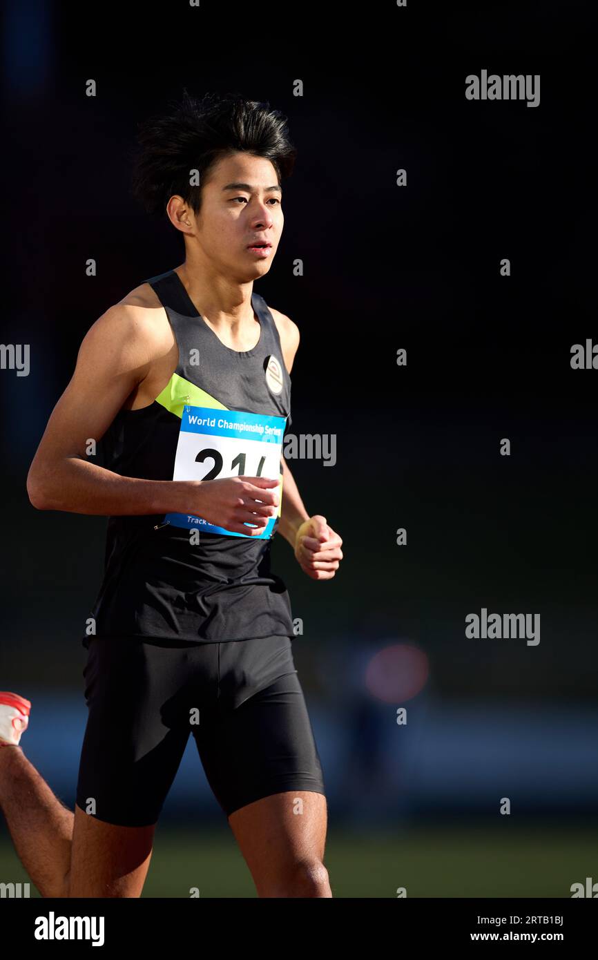 Japanese athlete running on track Stock Photo Alamy