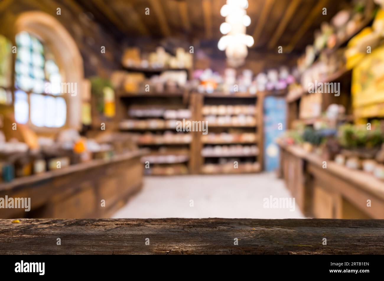 Rustic Wooden Counter with Blurred Pharmacy Interior ideal for product presentations or mockups. Stock Photo