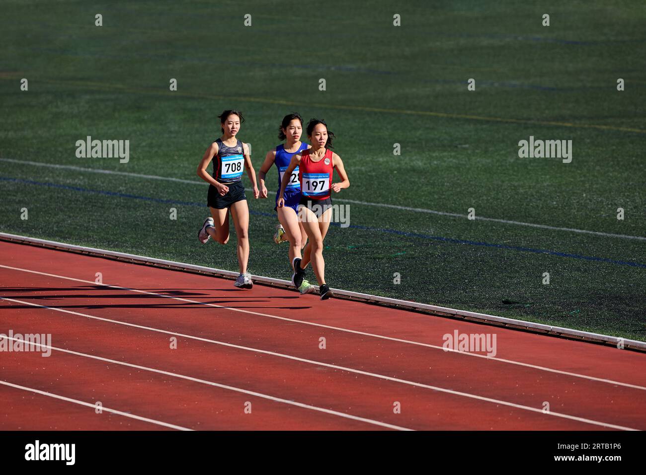Japanese athletes running on track Stock Photo Alamy