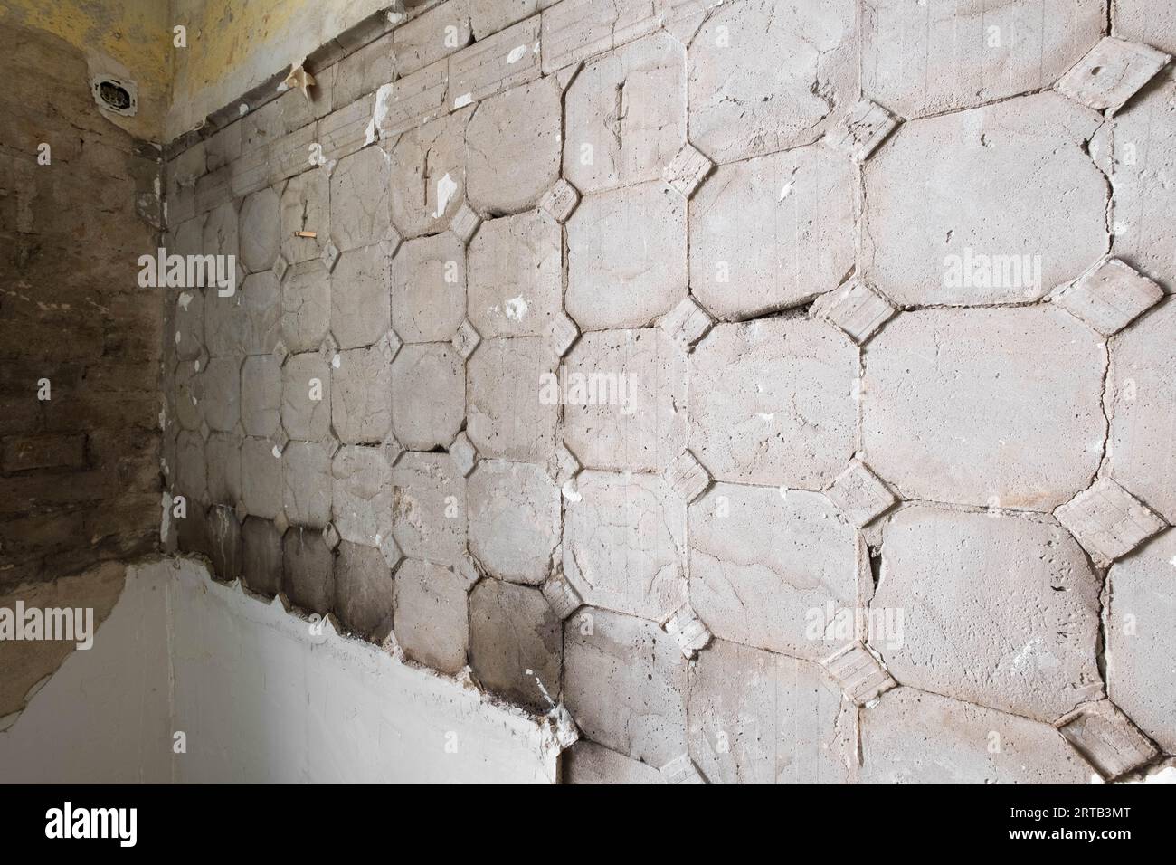 old kitchen wall after removing historic tiles, tile renovation Stock