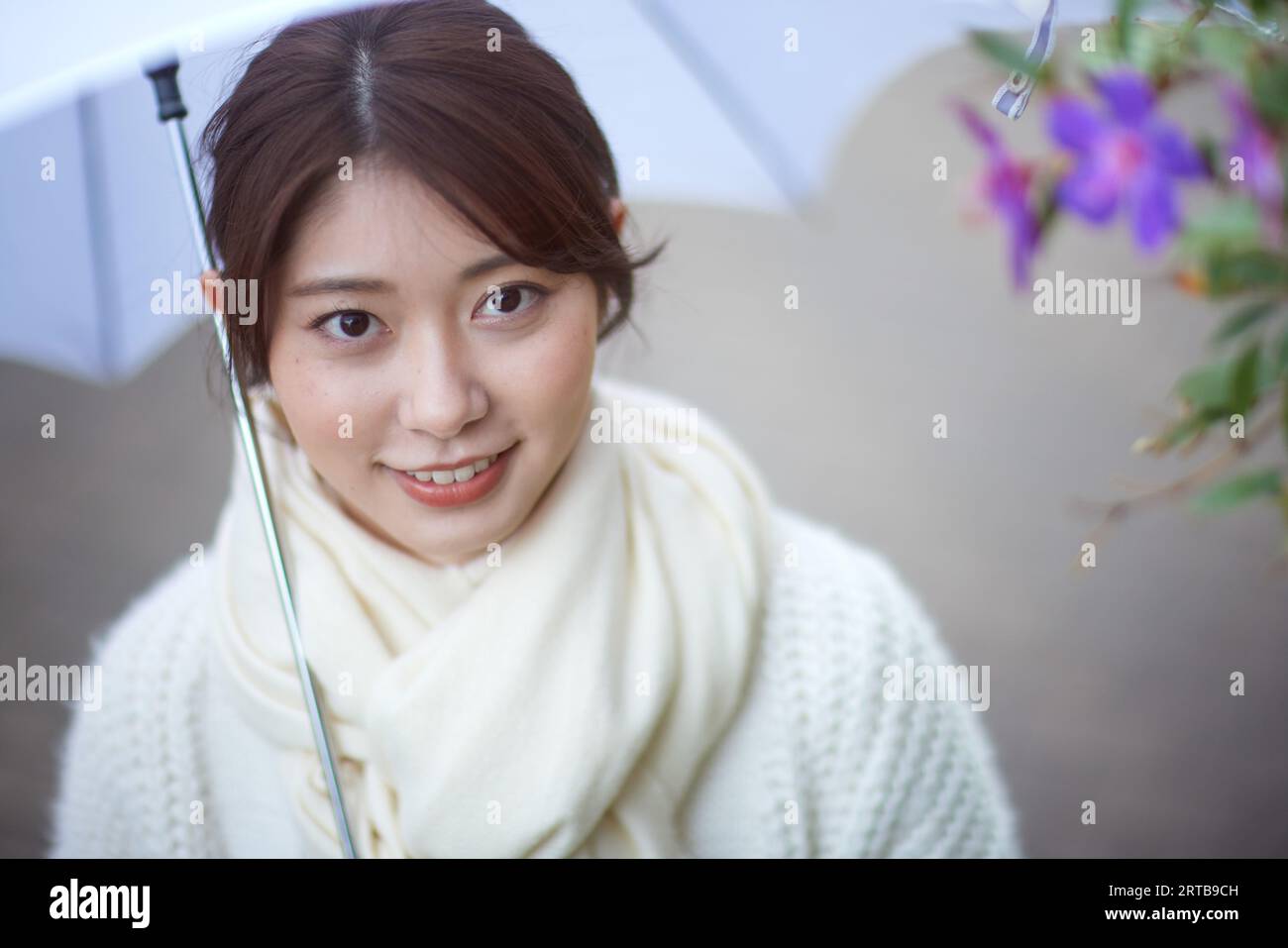 Japanese woman with umbrella outside Stock Photo - Alamy