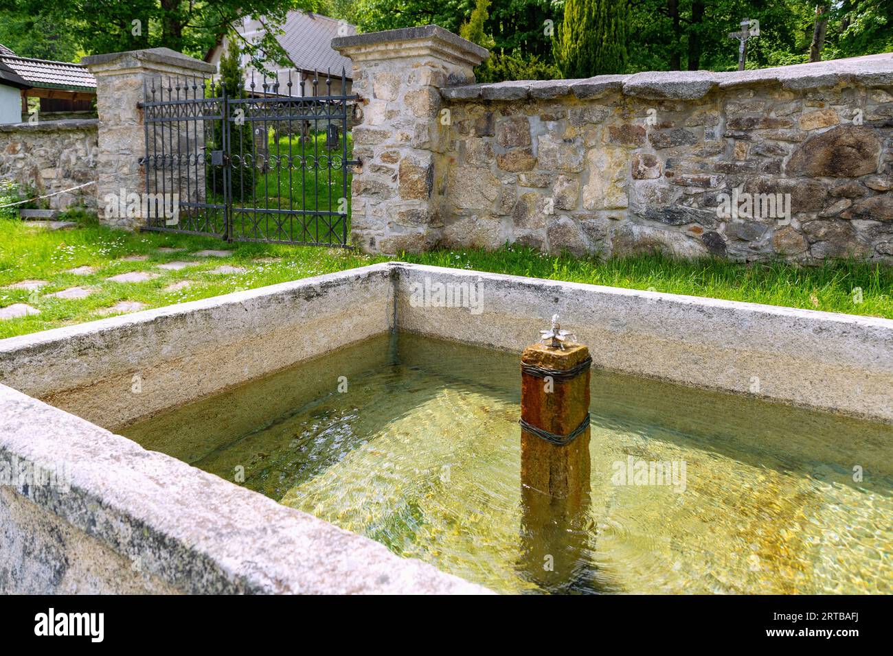historical horse trough on the Golden Trail in České Žleby in the ...