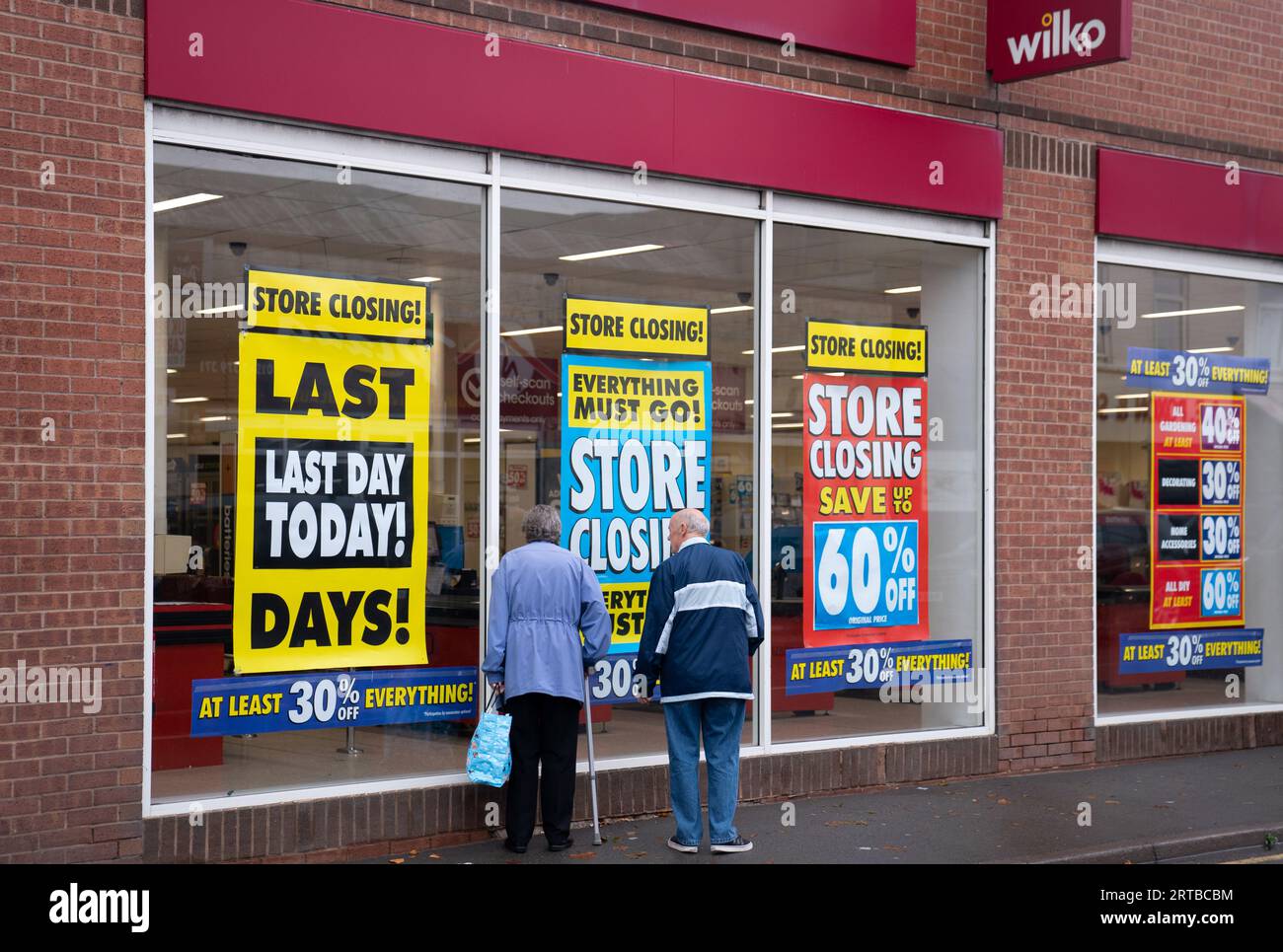 People look in the windows of Wilko in Brownhills near Walsall, one of ...