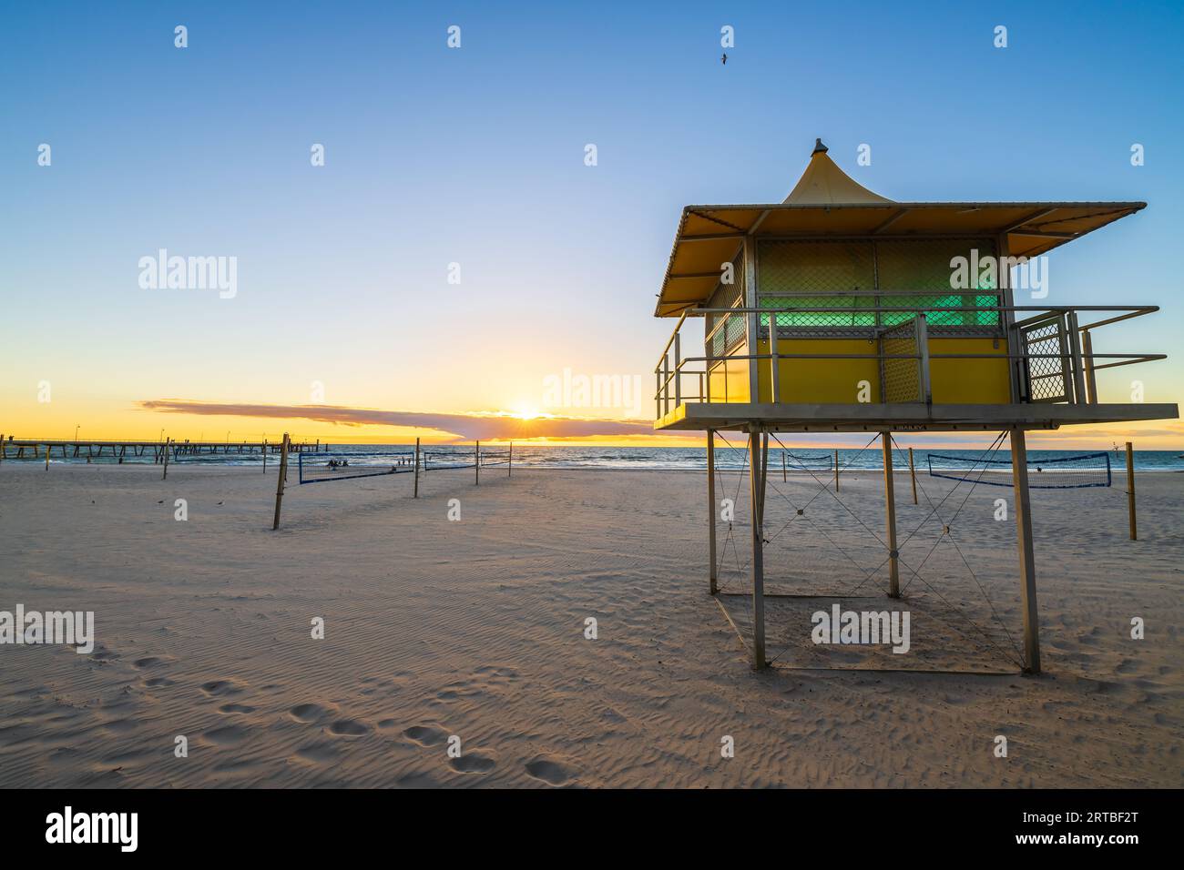 Glenelg Beach Surf life saving tower at Sunset, South Australia Stock Photo