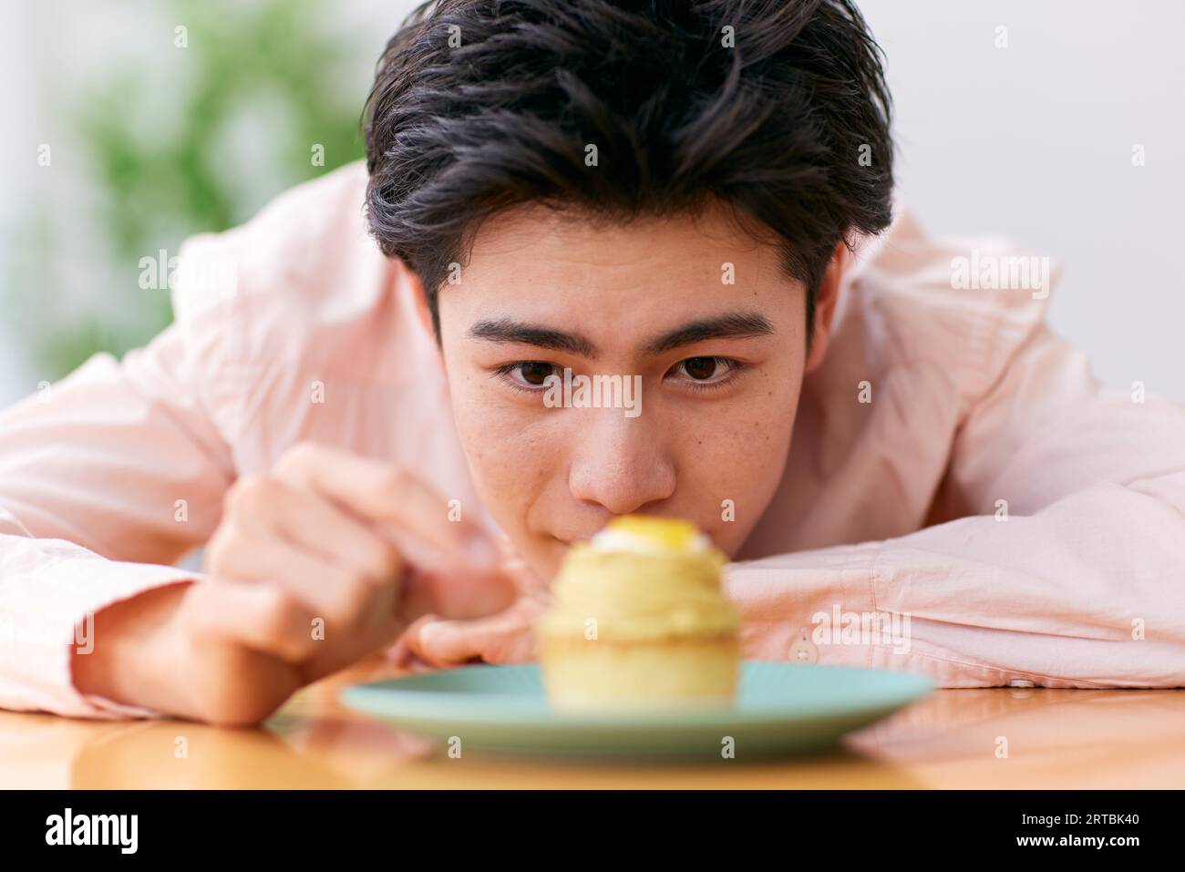 Japanese man eating at home Stock Photo Alamy