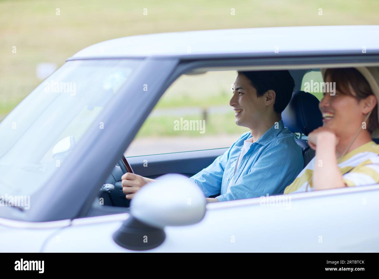 Japanese men driving Stock Photo