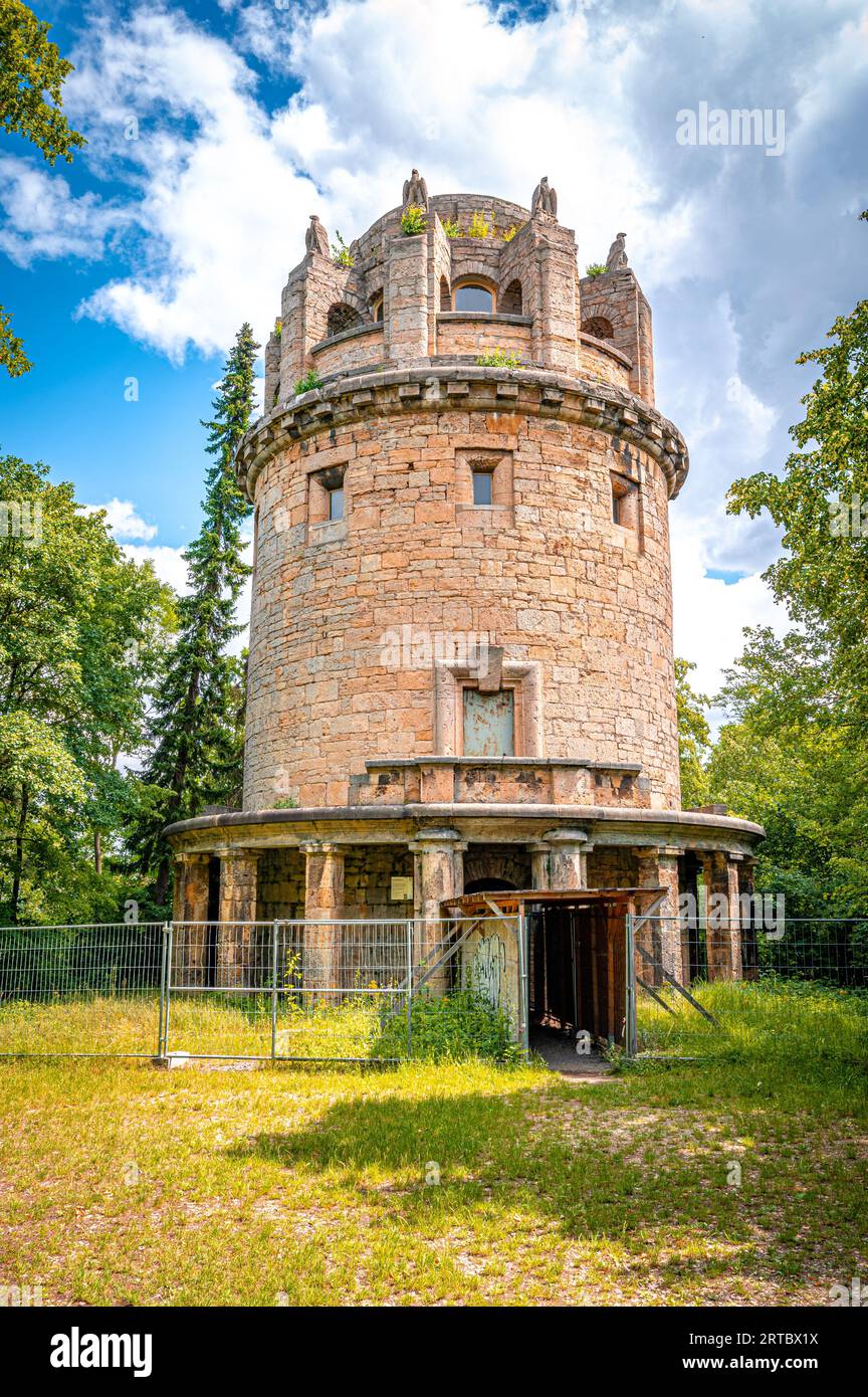 The Bismark Tower in Jena am Forst in the forest with a blue sky and