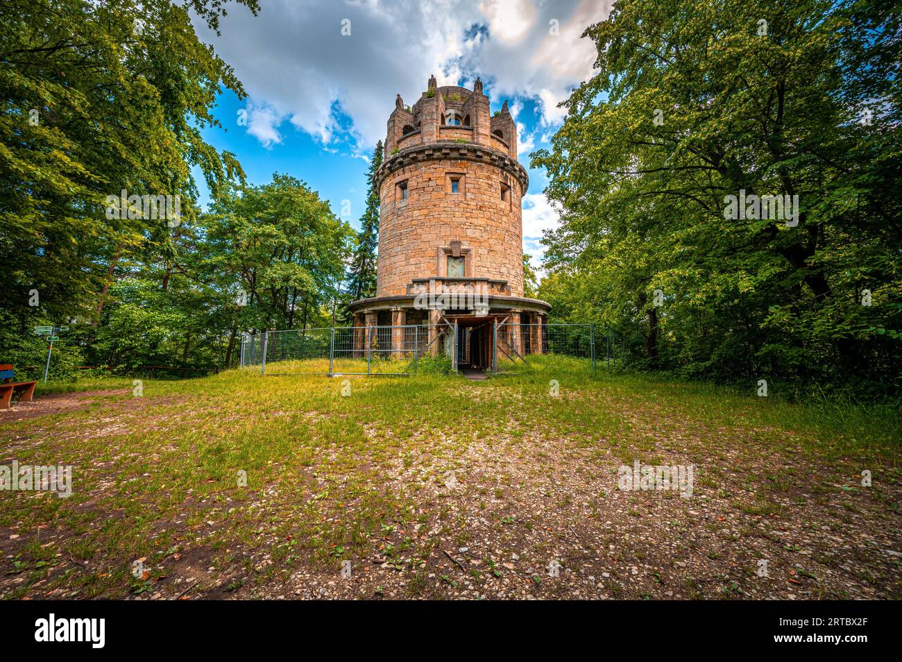 The Bismark Tower in Jena am Forst in the forest with a blue sky and