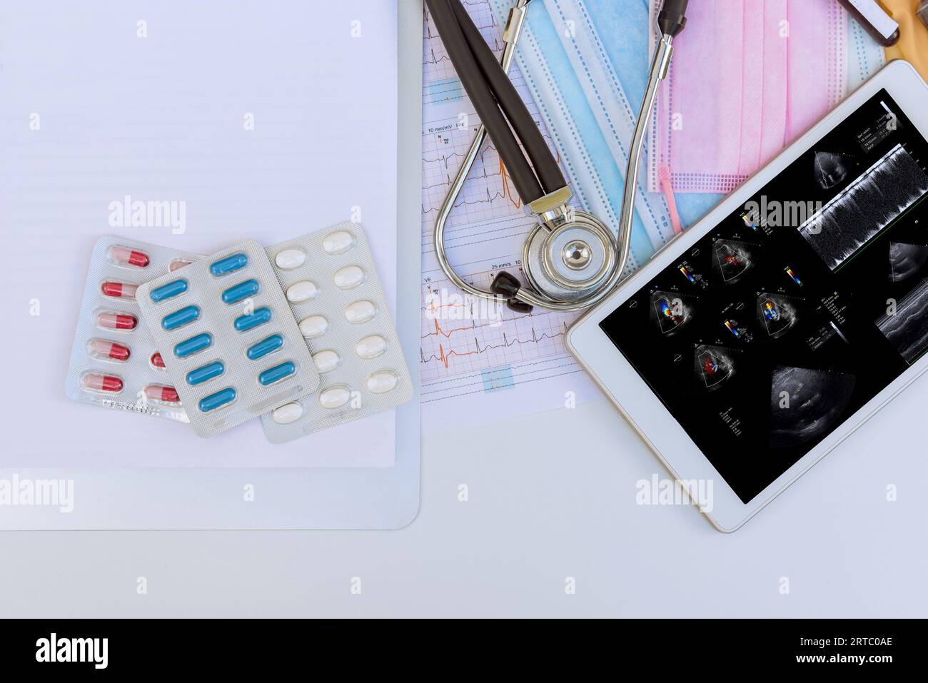 Doctor is checking patient cardiac activity on an ultrasound