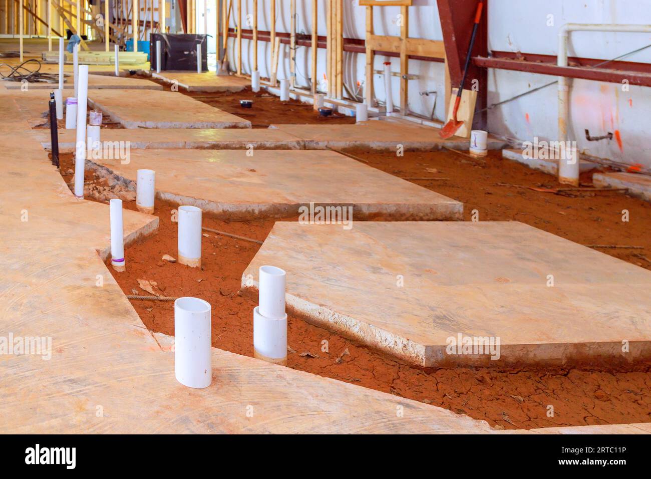 Drainage pvc pipe concrete floor reveals exposed endings for future