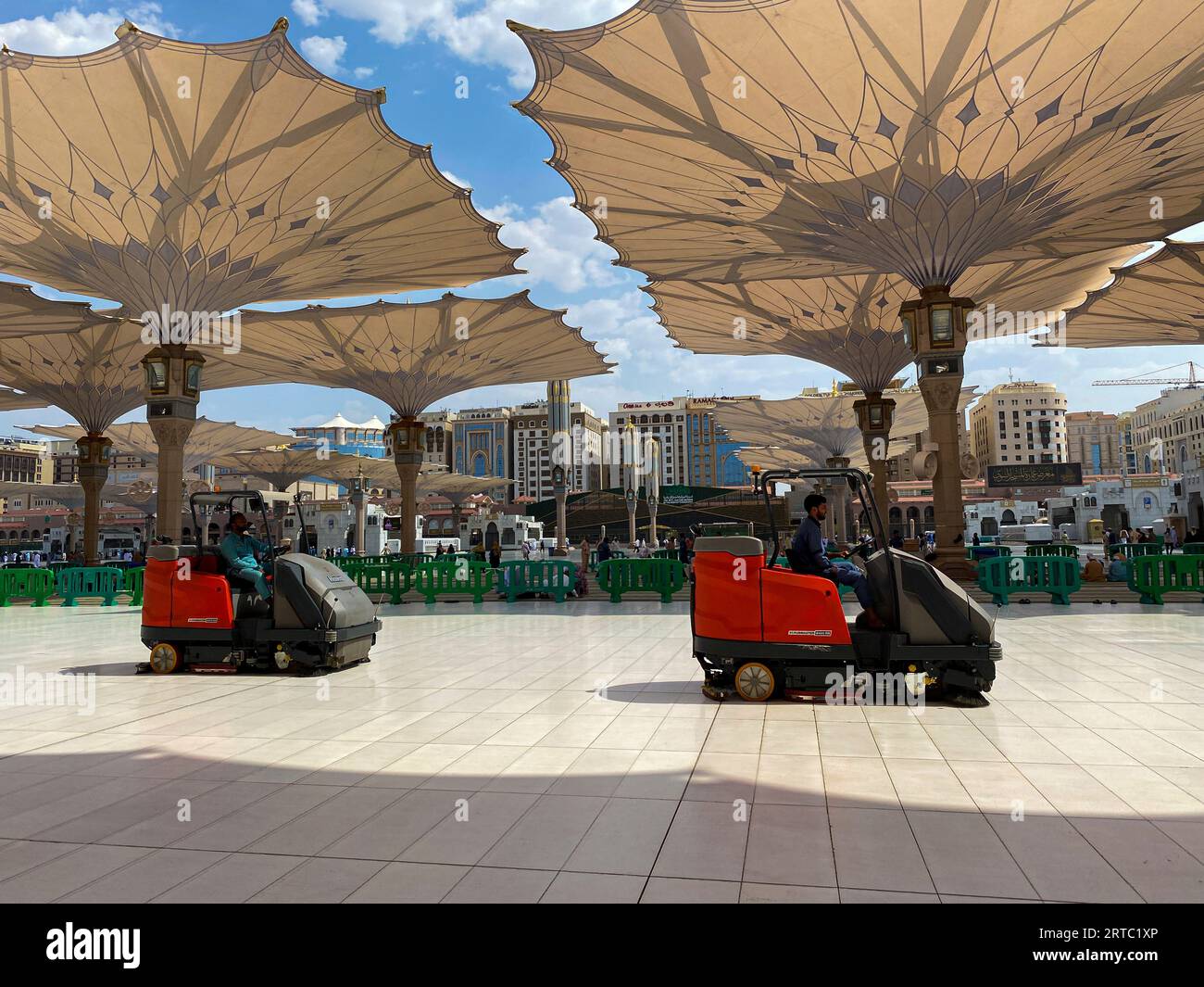 Medina, Saudi Arabia August 22, 2023 Pilgrims walk underneath giant