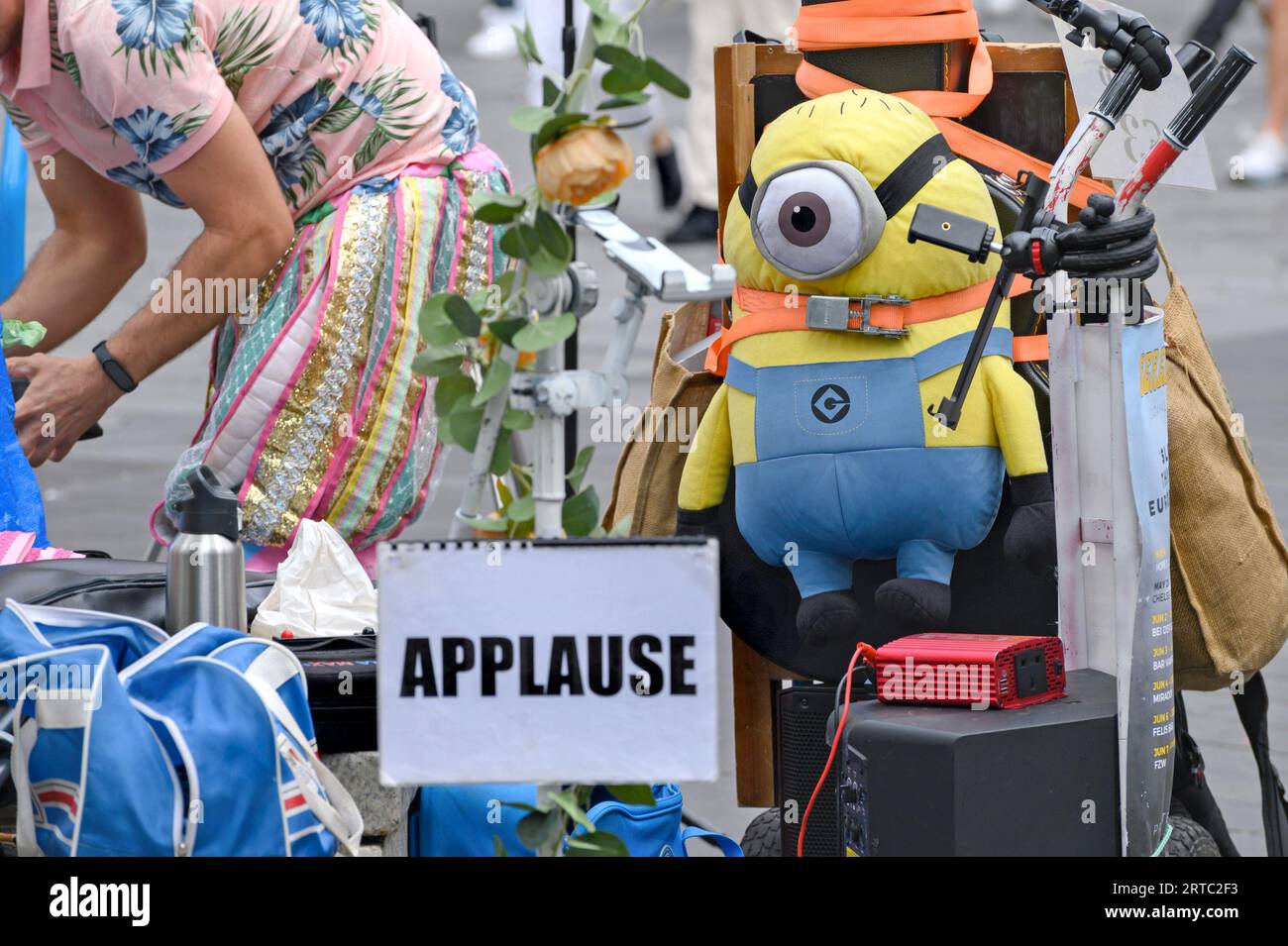 London, England, UK. Minion toy attached to a busker's backpack. Trafalgar Square Stock Photo