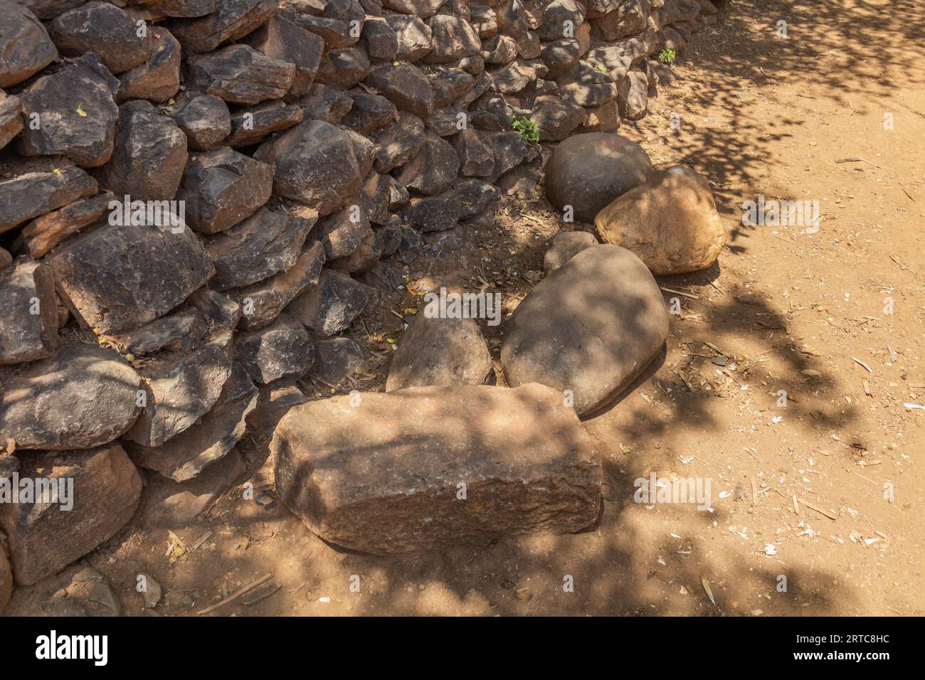 Age stones in a traditional Konso village, Ethiopia. Age of boys in Konso culture is determined by the weight of a stone he is able to throw. Stock Photo
