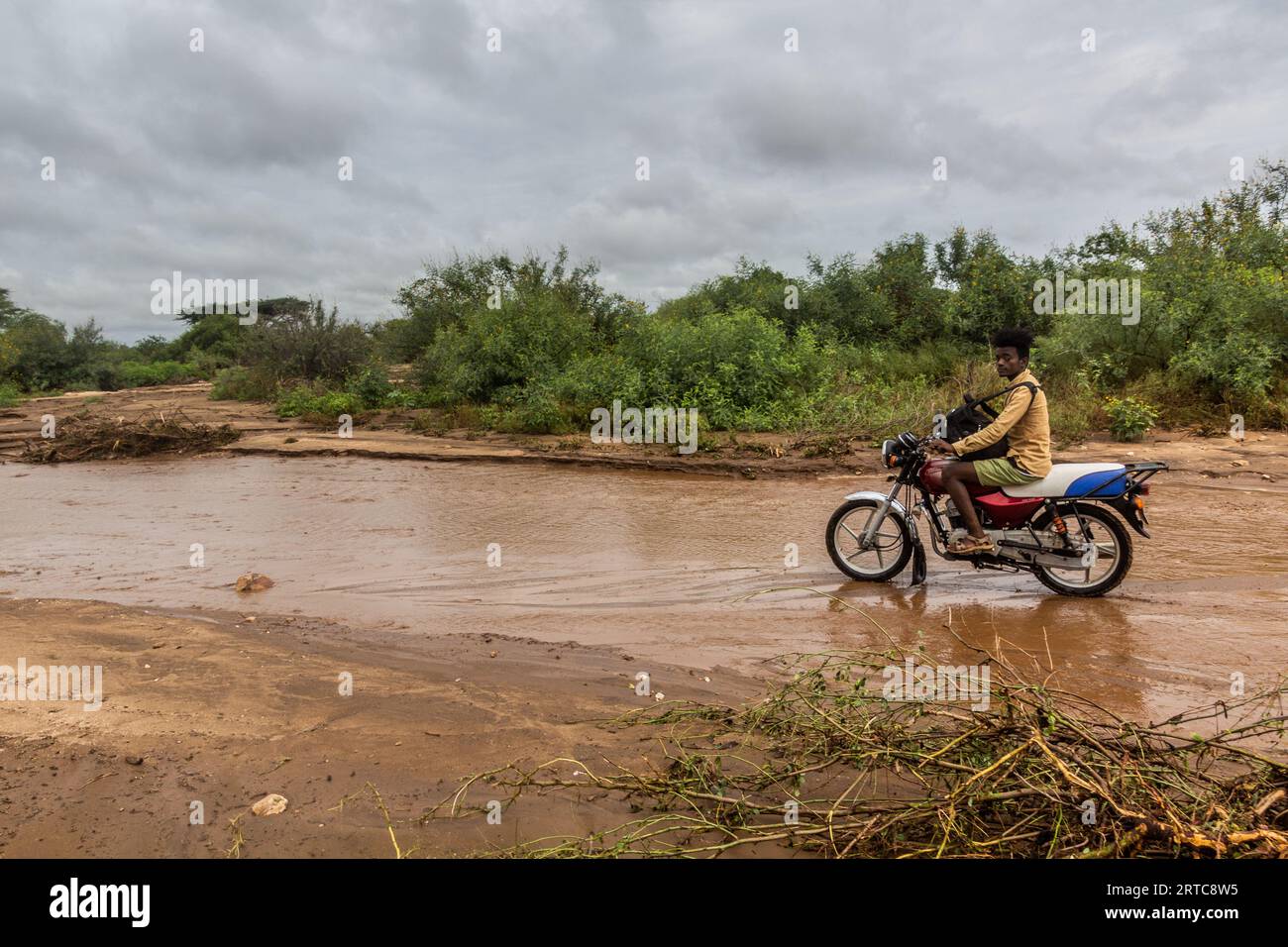 OMO VALLEY, ETHIOPIA FEBRUARY 4, 2020 Motorbike on a muddy road in