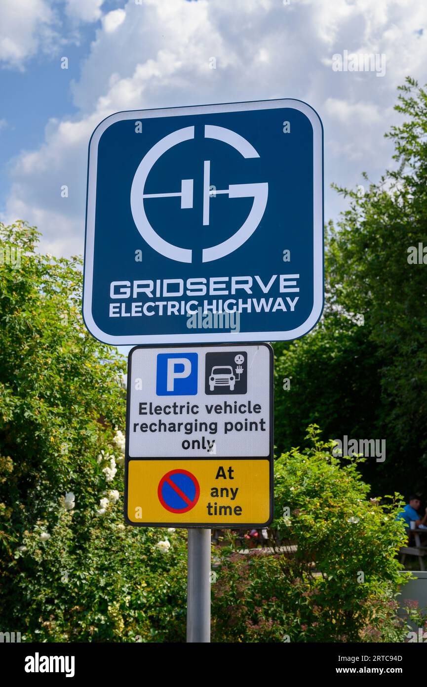 Electric vehicle chanrging point at motorway services in England. Stock Photo