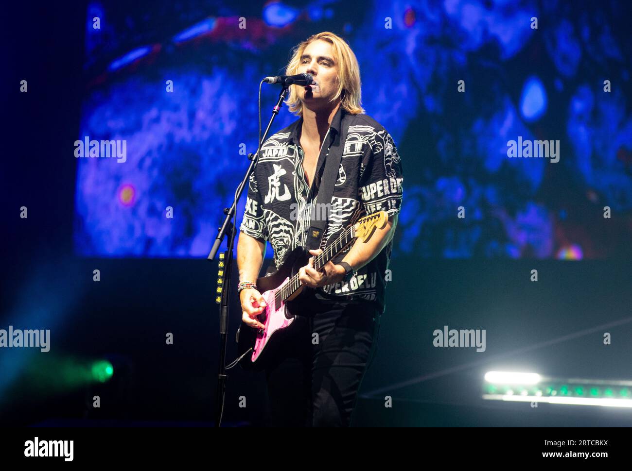 Charlie Simpson of Busted performs on stage at The O2 Arena
