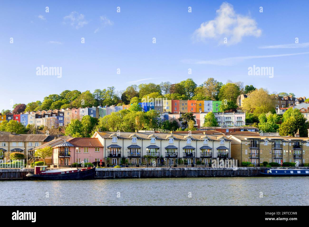 10 May 2023: Bristol. UK - Colourful houses and apartments overlooking Bristol Docks. Stock Photo