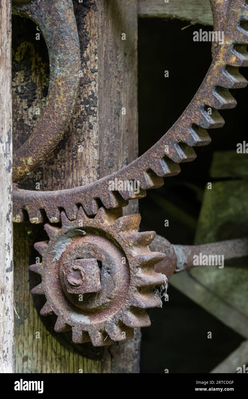Rusty gears from old mechanism photographed at close range. Stock Photo