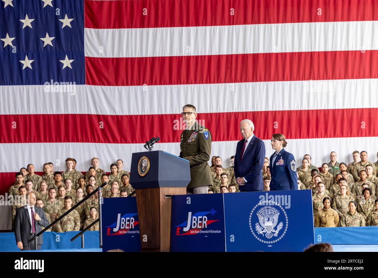 Anchorage, United States Of America. 11th Sep, 2023. Anchorage, United States of America. 11 September, 2023. Army Maj. Gen. Brian Eifler, commanding general of the 11th Airborne Division, introduces U.S. President Joe Biden, center, during a commemoration on the 22nd anniversary of the terrorist attacks of 9/11 during a remembrance ceremony at Joint Base Elmendorf-Richardson, September 11, 2023 in Anchorage, Alaska. Credit: SFC Ian Morales/U.S. Army/Alamy Live News Stock Photo