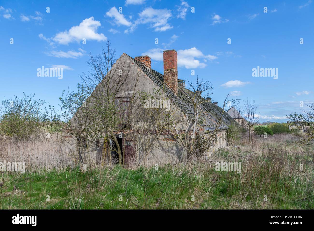 old rotten house in the field in Usedom, Germany Stock Photo