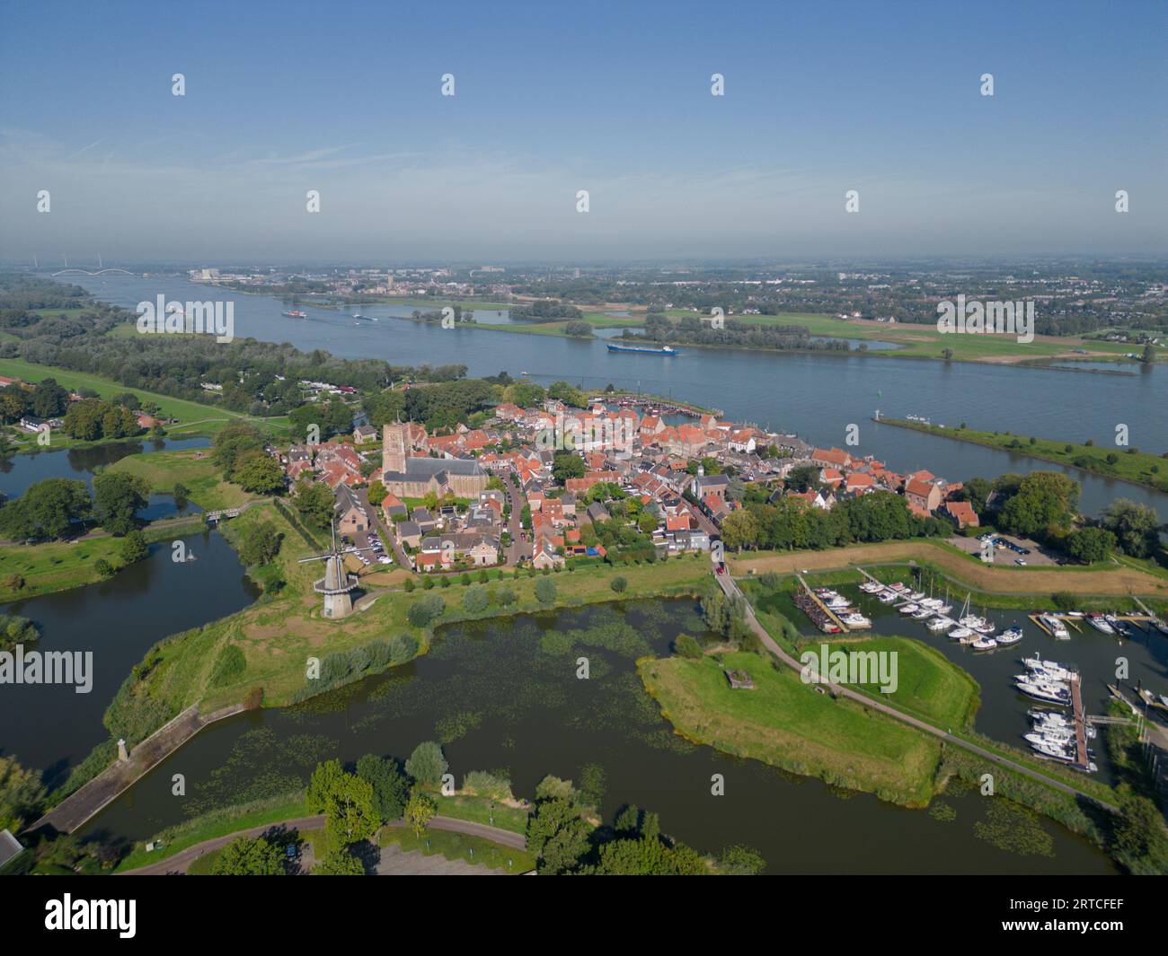 Aerial from the historical city Woudrichem at the river Merwede in the Netherlands. Stock Photo