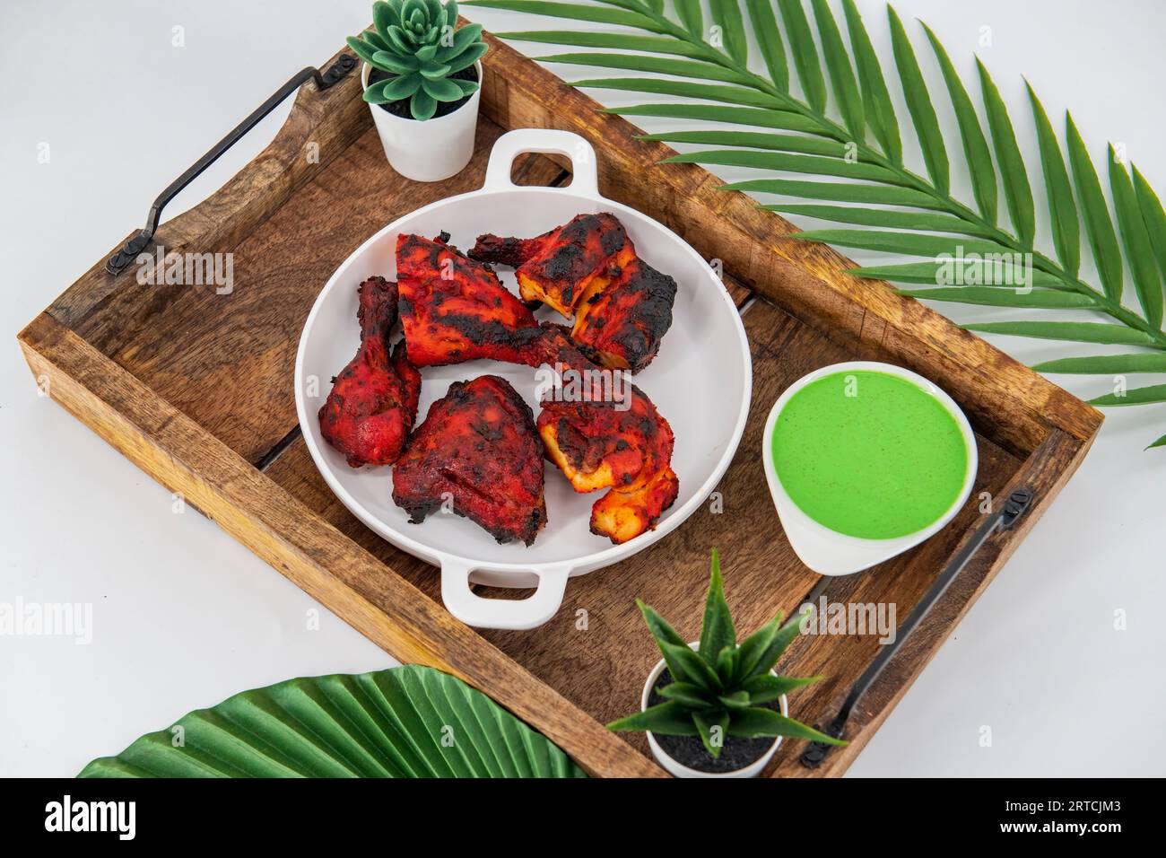 Tandoori chicken dish originating from Indian subcontinent Spicy Tandoori chicken dish originating from Indian subcontinent Spicy