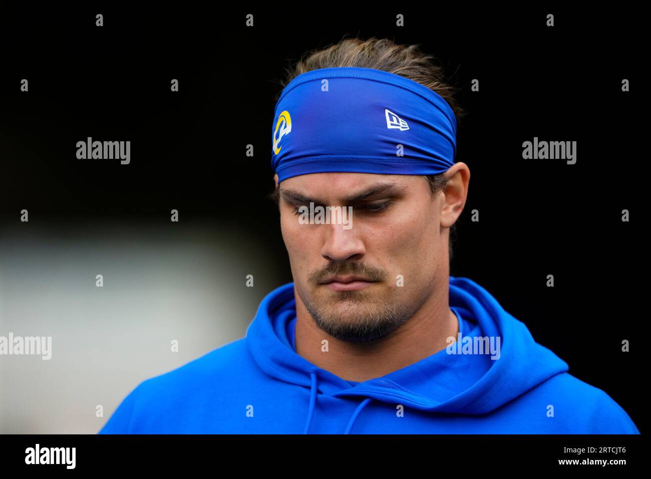 Los Angeles Rams linebacker Christian Rozeboom walks onto the field before an NFL football game