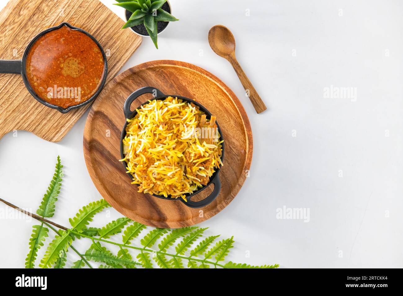 Dum Handi Mutton Biryani or gosht pilaf is prepared in an earthen or clay pot called Handi.  Popular Indian non vegetarian food. Special handi biryani Stock Photo