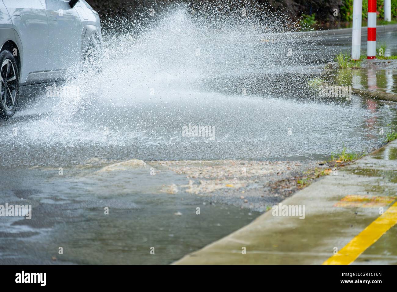 Car tire splashing in water hi-res stock photography and images - Alamy