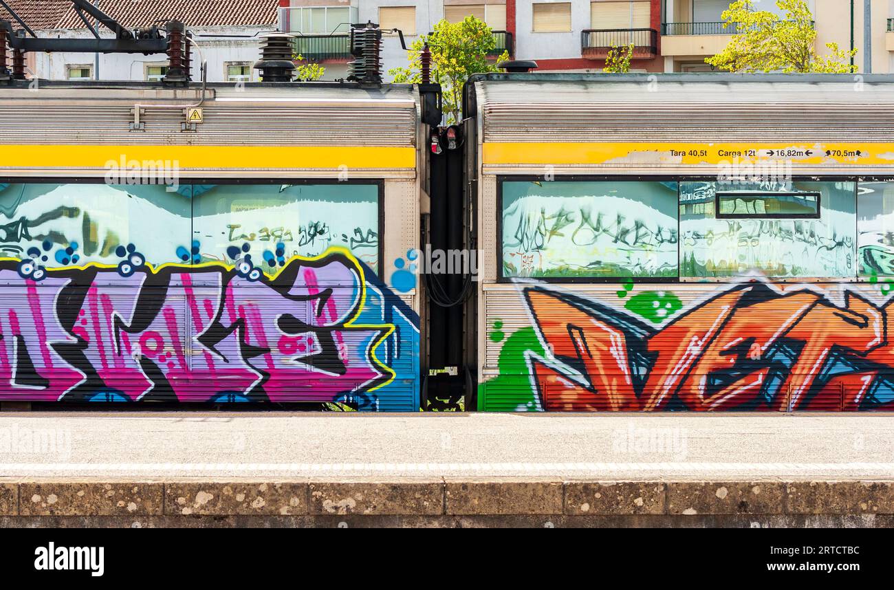 Graffitied train carriages at Tomar Station, Portugal Stock Photo