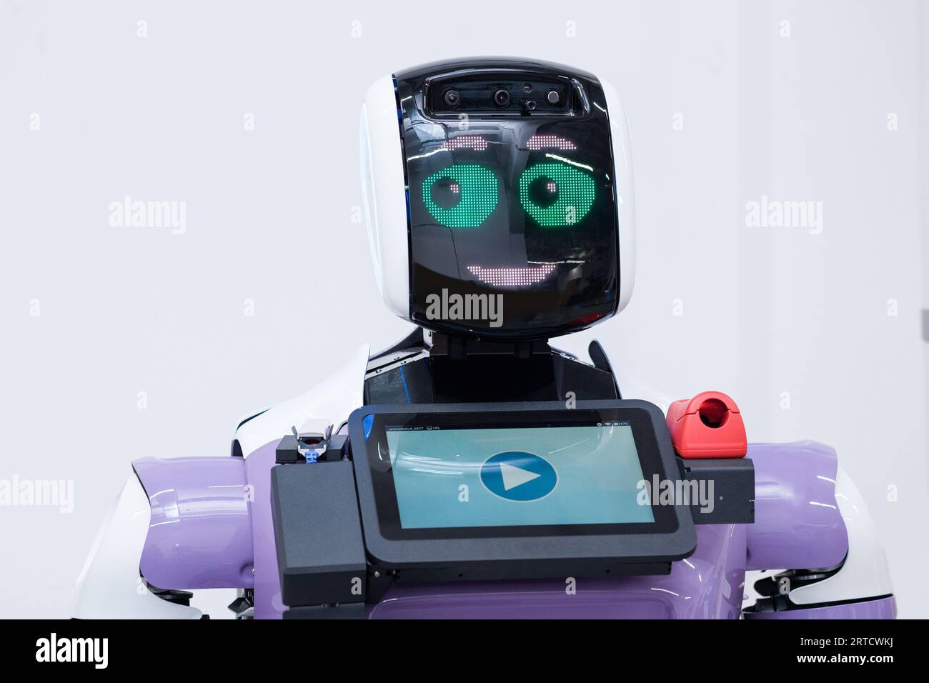 Perm, Russia - July 13, 2023: friendly humanoid robot guide expressing ...