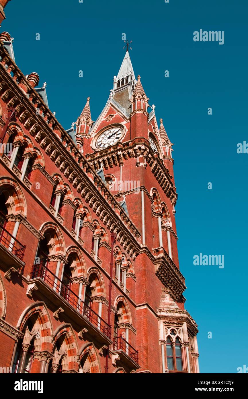 The Victorian Clock Tower On The Midland Grand Hotel At St Pancras Station Designed By George Gilbert Scott, London UK Stock Photo