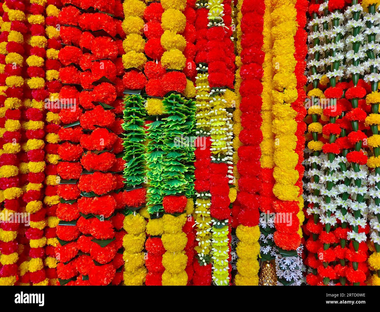 Multicolour artificial flowers used for Diwali festival decoration