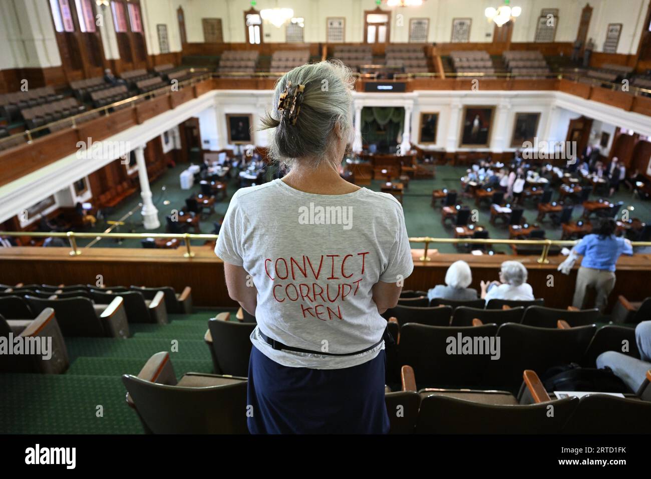 A woman, who asked not to be identified, stands in the gallery withh a miessage for the Texas senators during the morning of day six in Texas Attorney General Ken Paxton's impeachment trial in the Texas Senate on September 12, 2023. Credit: Bob Daemmrich/Alamy Live News Stock Photo