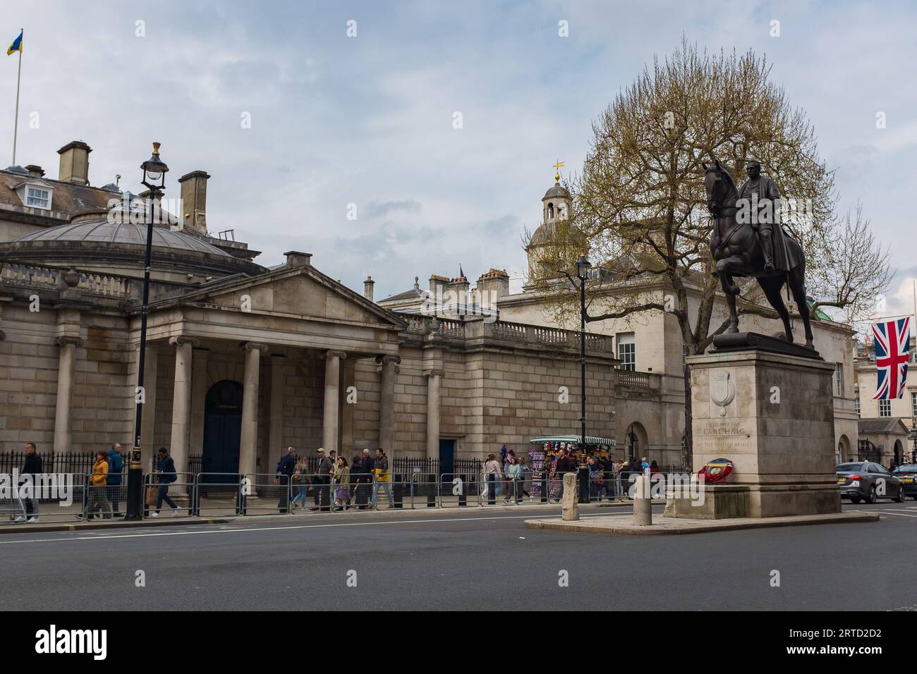 London, UK, 2023. Dover House (London HQ of the Office of the Secretary of State for Scotland), with Earl Haig's memorial in the foreground Stock Photo