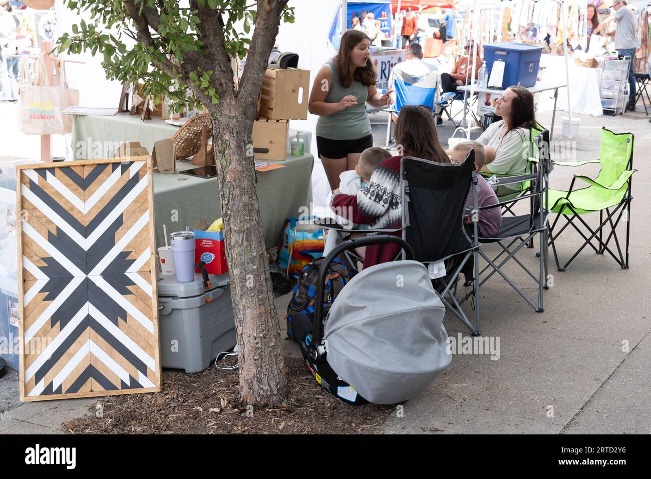 Vendors discuss their tastes in music during the Junk Junktion street