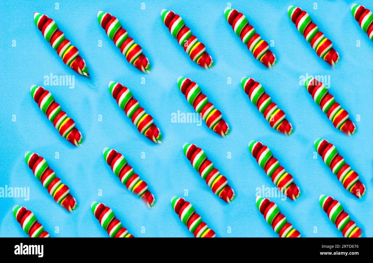 colored, different sweets, lollipops on a blue background. Top view, sweets concept Stock Photo