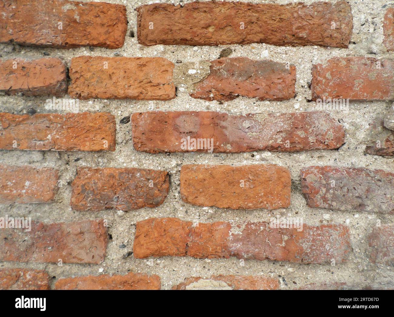 cracked cement brick block surface as background for design Stock Photo